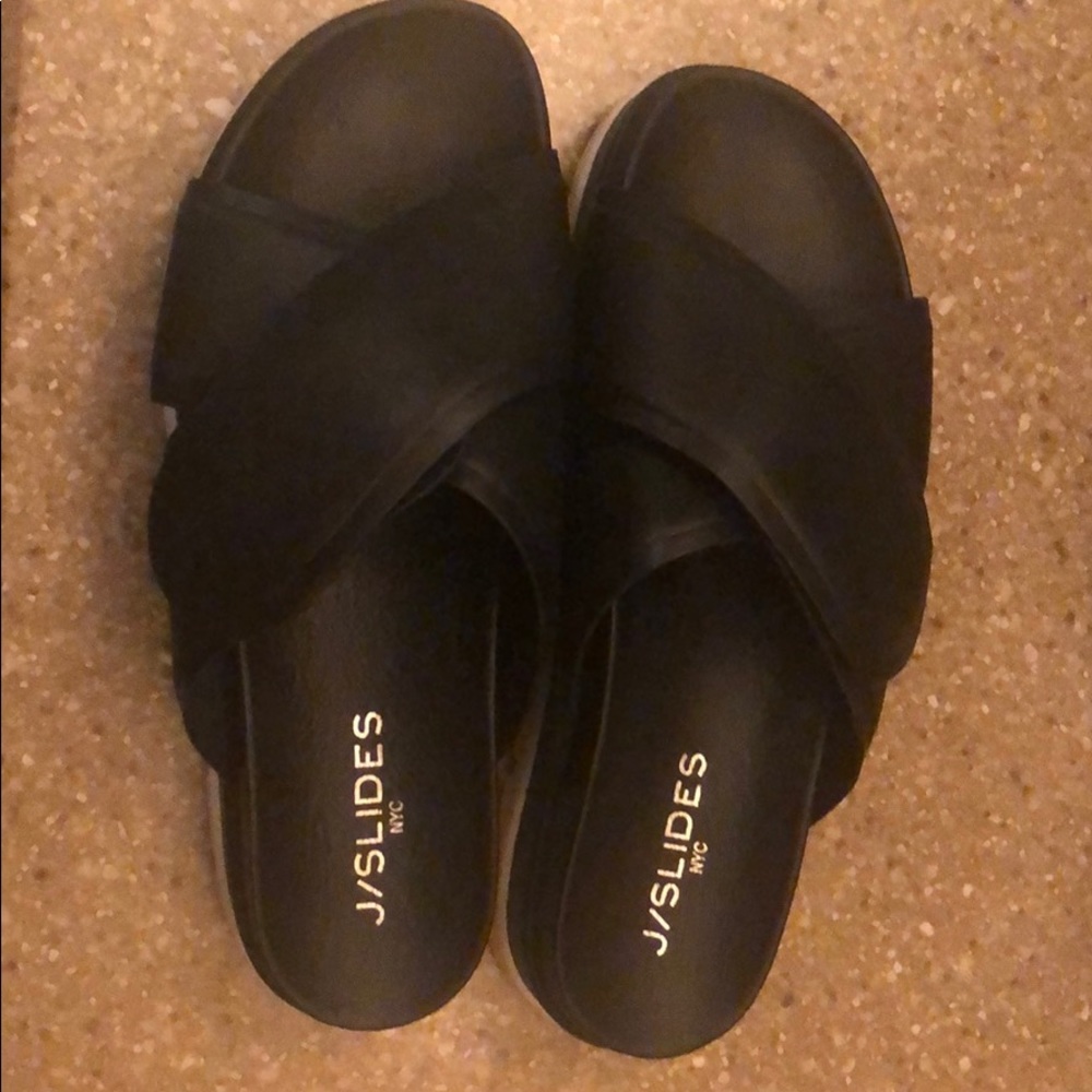 Like new J Slides. Black with white platform sole